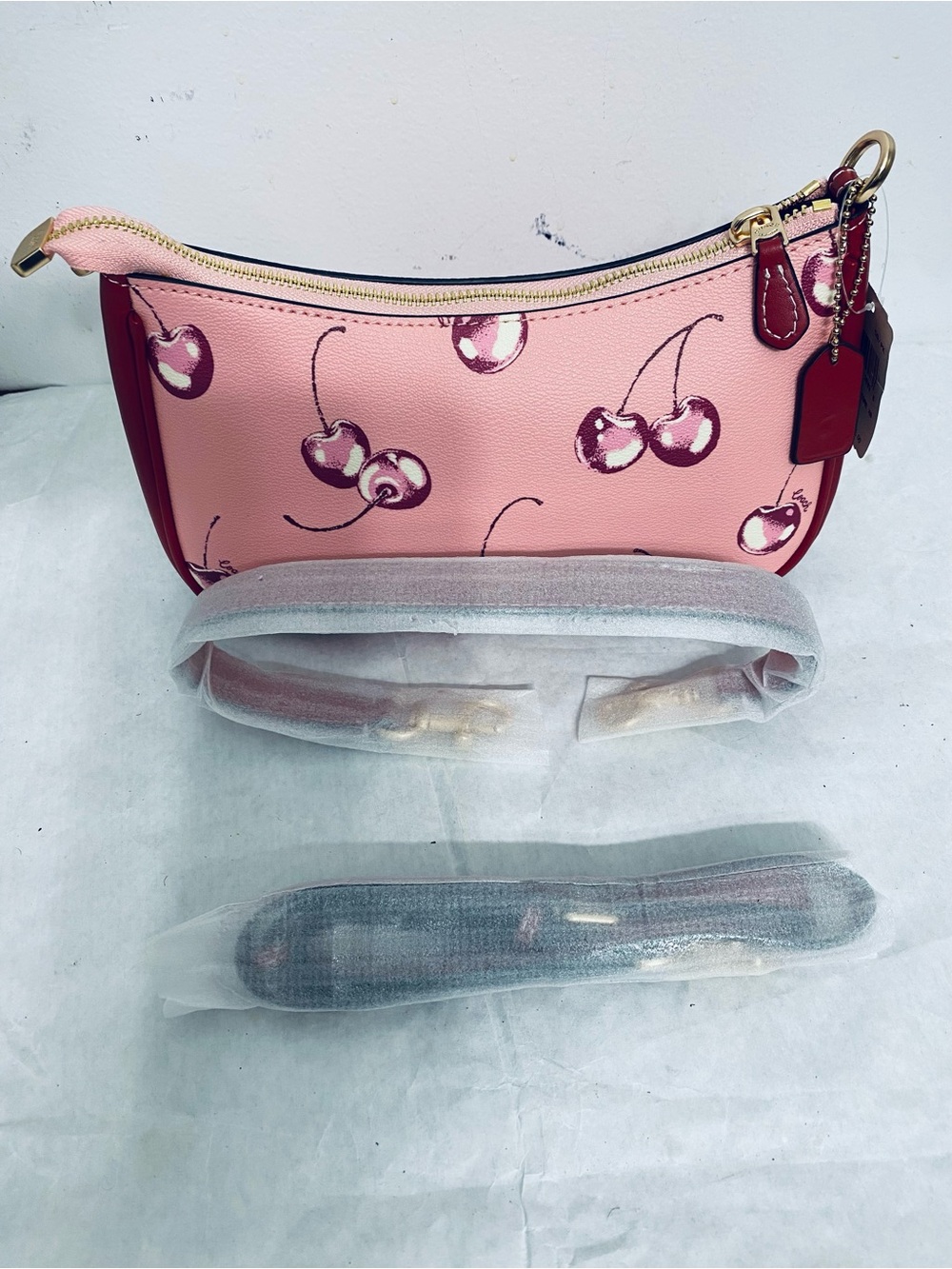 Coach Pink Cherry Teri Print Shoulder and Crossbody Bag .